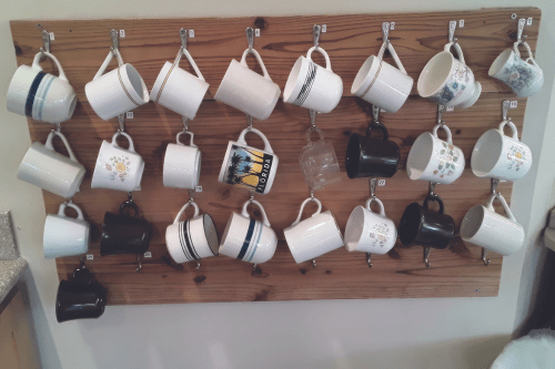 Wall hangers image with 25 coffee mugs