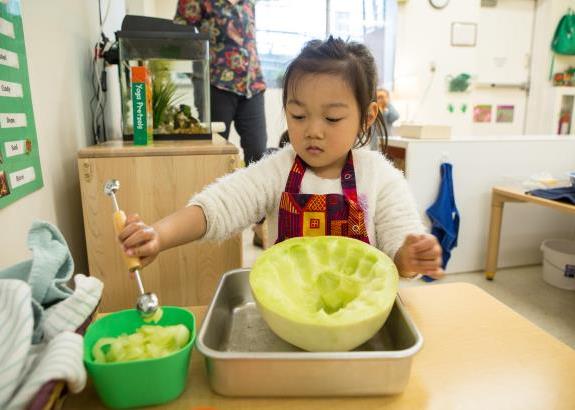 Early Childhood Student Prepares a Snack