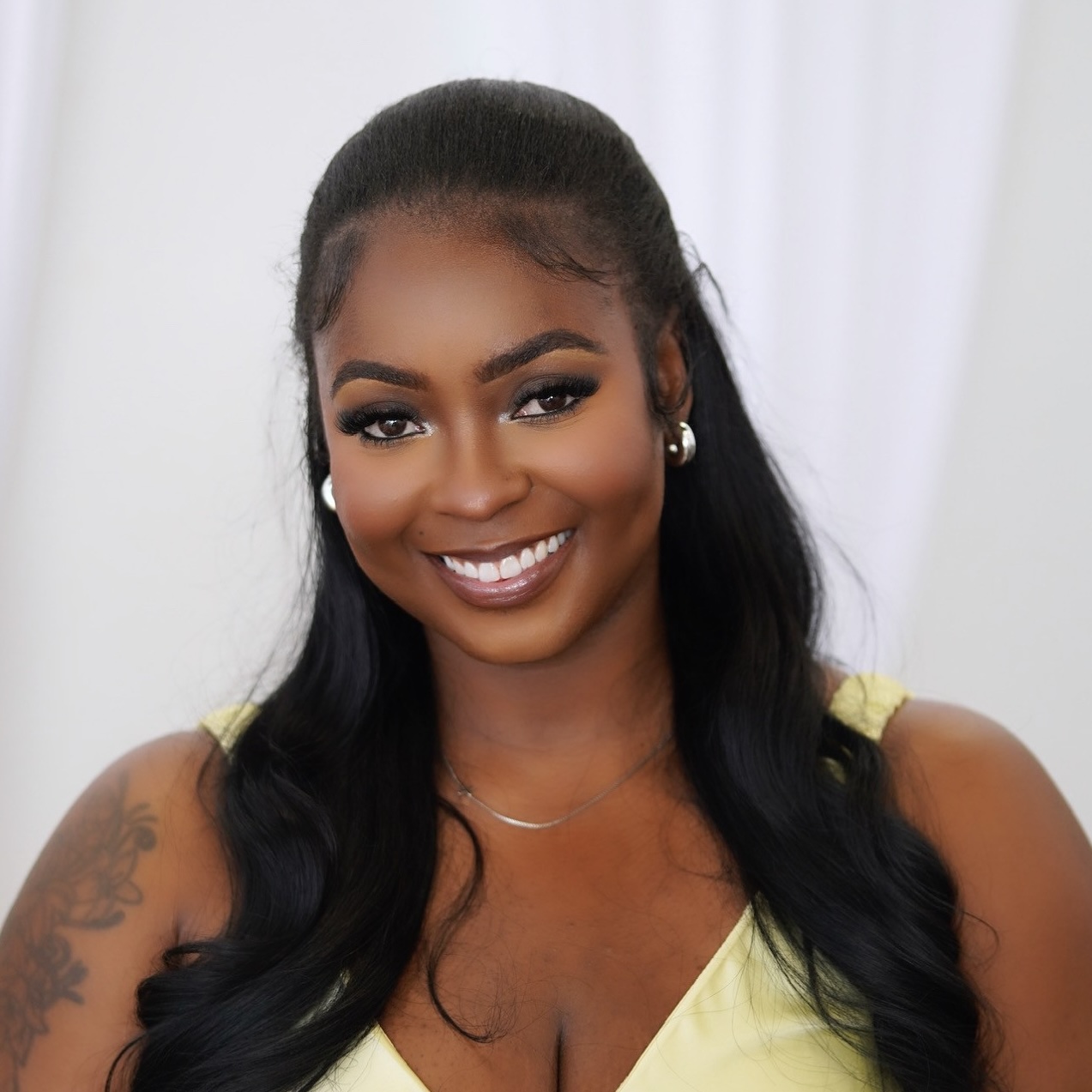 headshot of Nakilia, communications manager