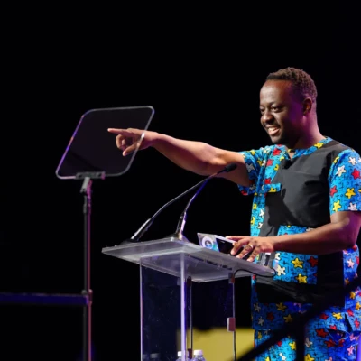 Tatenda Blessing Muchiriri accepting the Montessori Innovator award at The Montessori Event 2024 in Orlando, FL.